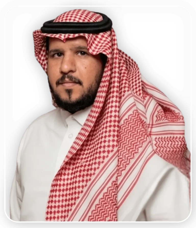 رجل سعودي يرتدي الزي التقليدي بما في ذلك الشماغ الأحمر والأبيض والعقال